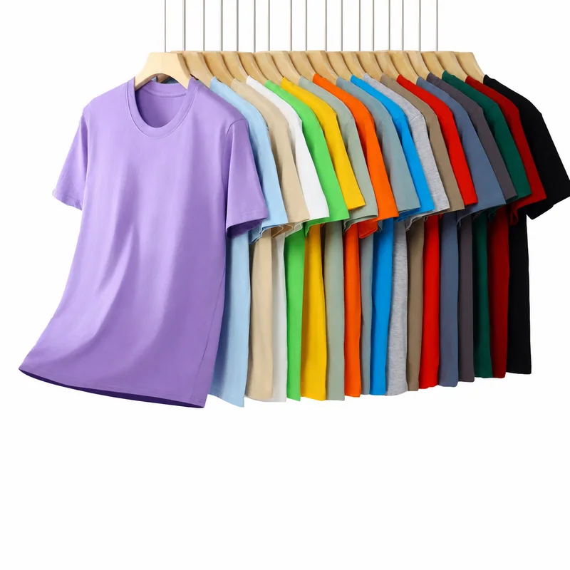 Plain T-shirts arranged on hangers in multiple colors