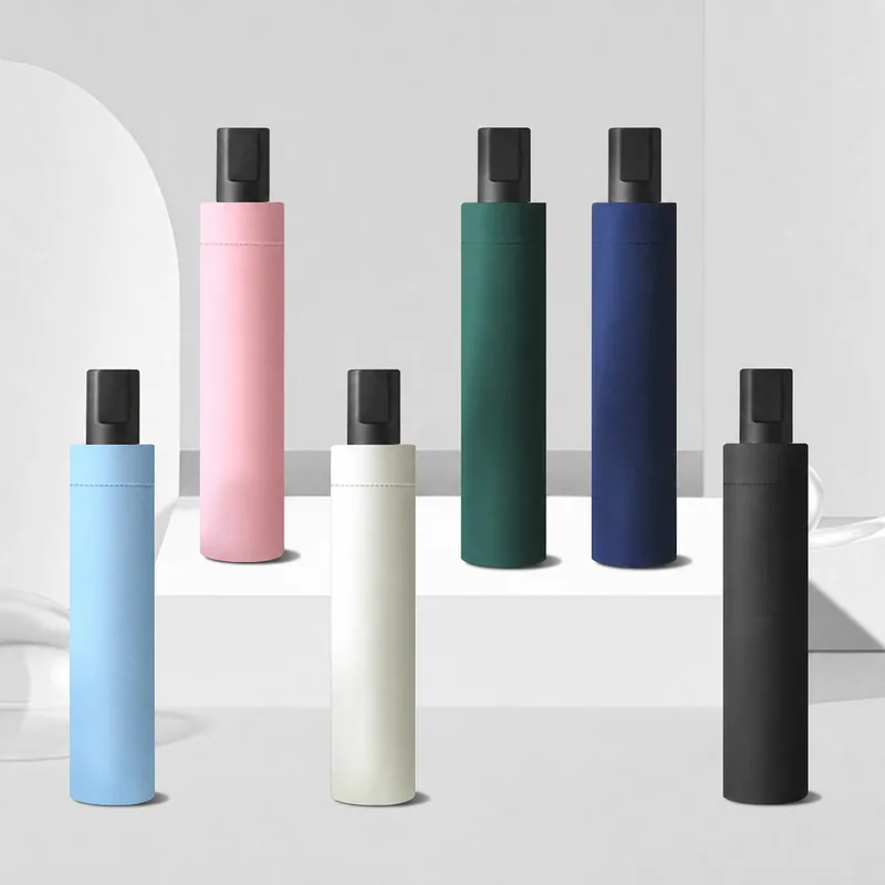 Compact umbrella sleeve color options in blue, pink, white, green, navy and black