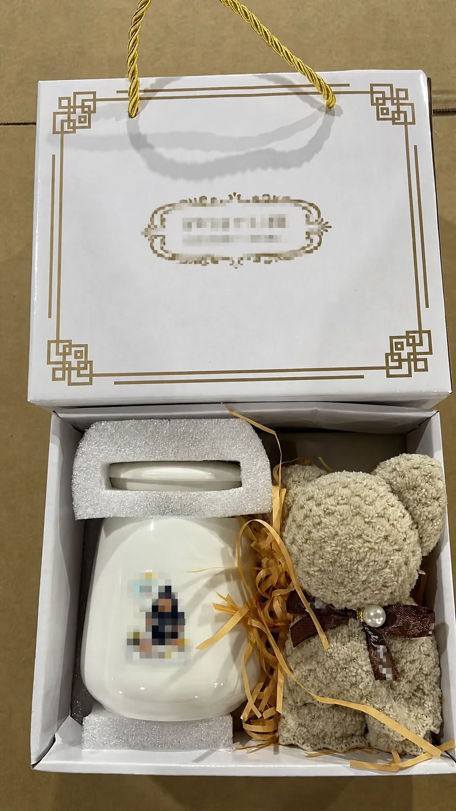 Anonymized ceramic mug and towel gift set pack-out